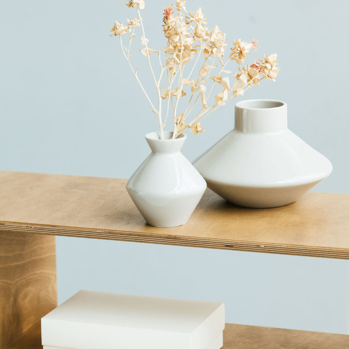 closeup-on-details-vase-on-wooden-mid-century-modern-bookcase