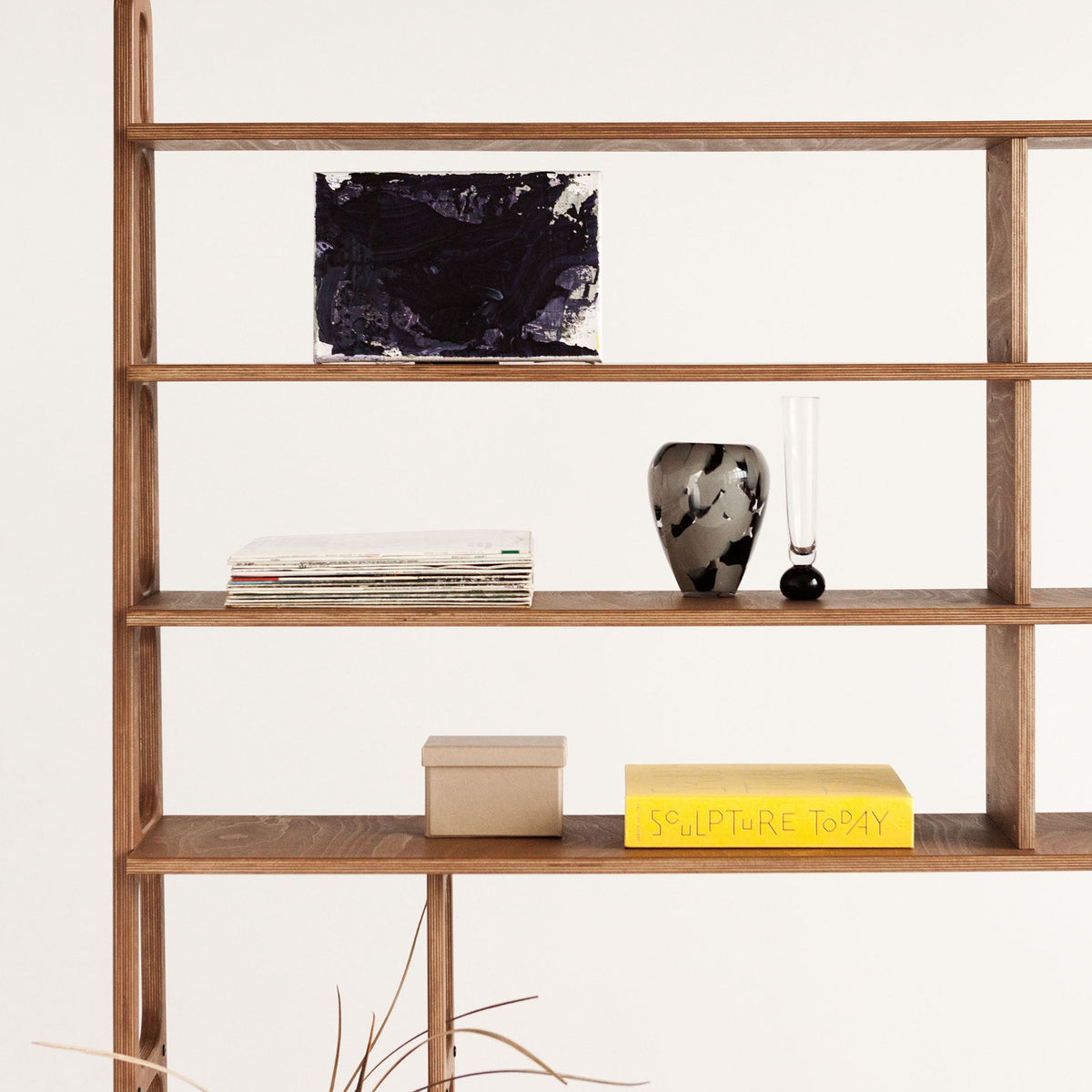 detail-of-mid-century-bookcase-with-cabinet-and-drawers-walnut-stain-in-living-room