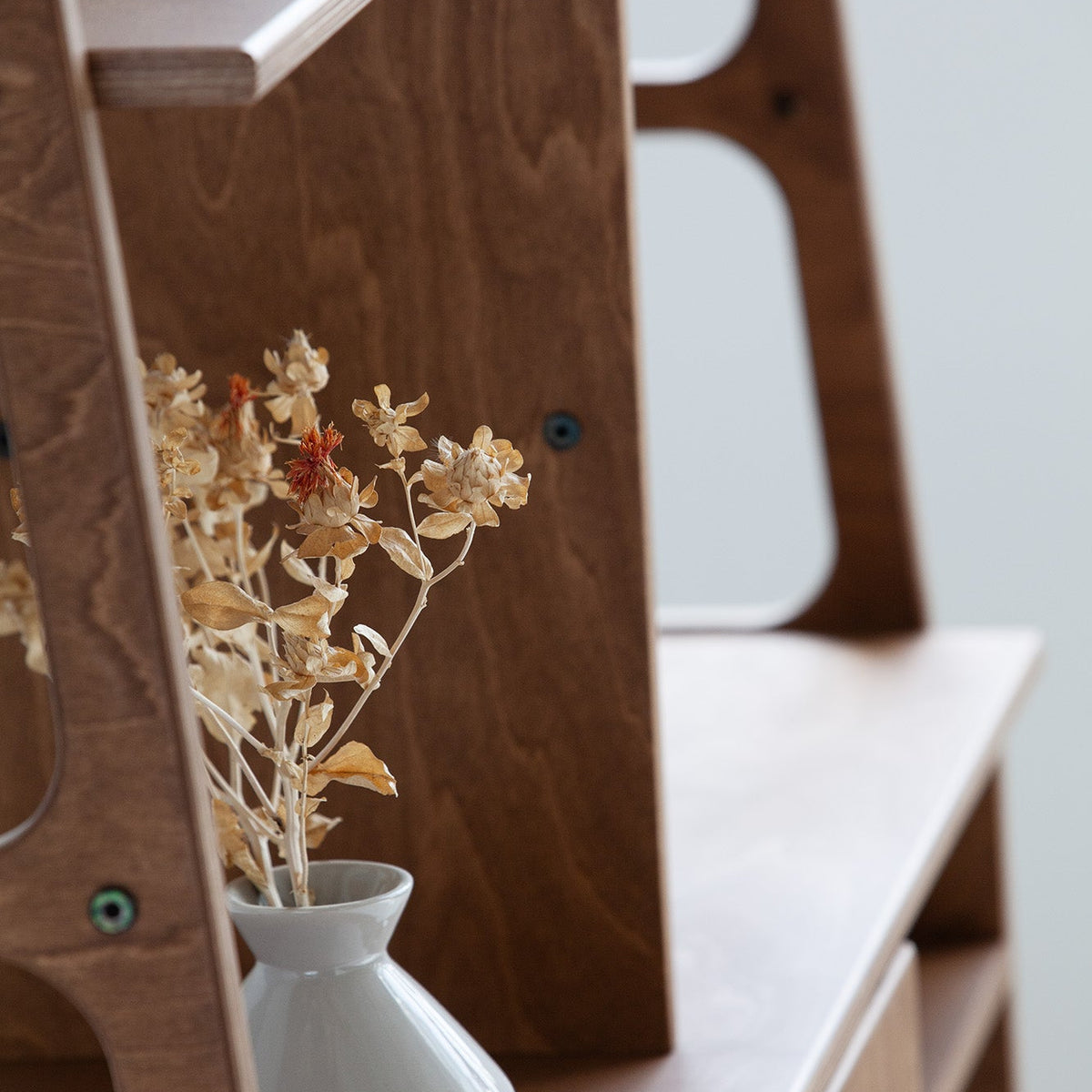     detail-of-mid-century-modern-record-player-stand-wooden-in-walnut-stain
