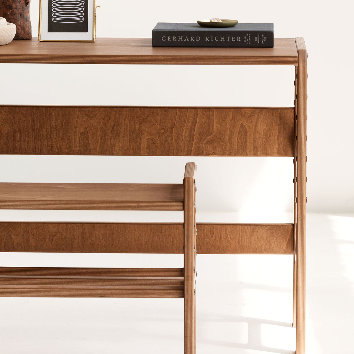 detail-of-wooden-growing-desk-for-kids-in-full-sun