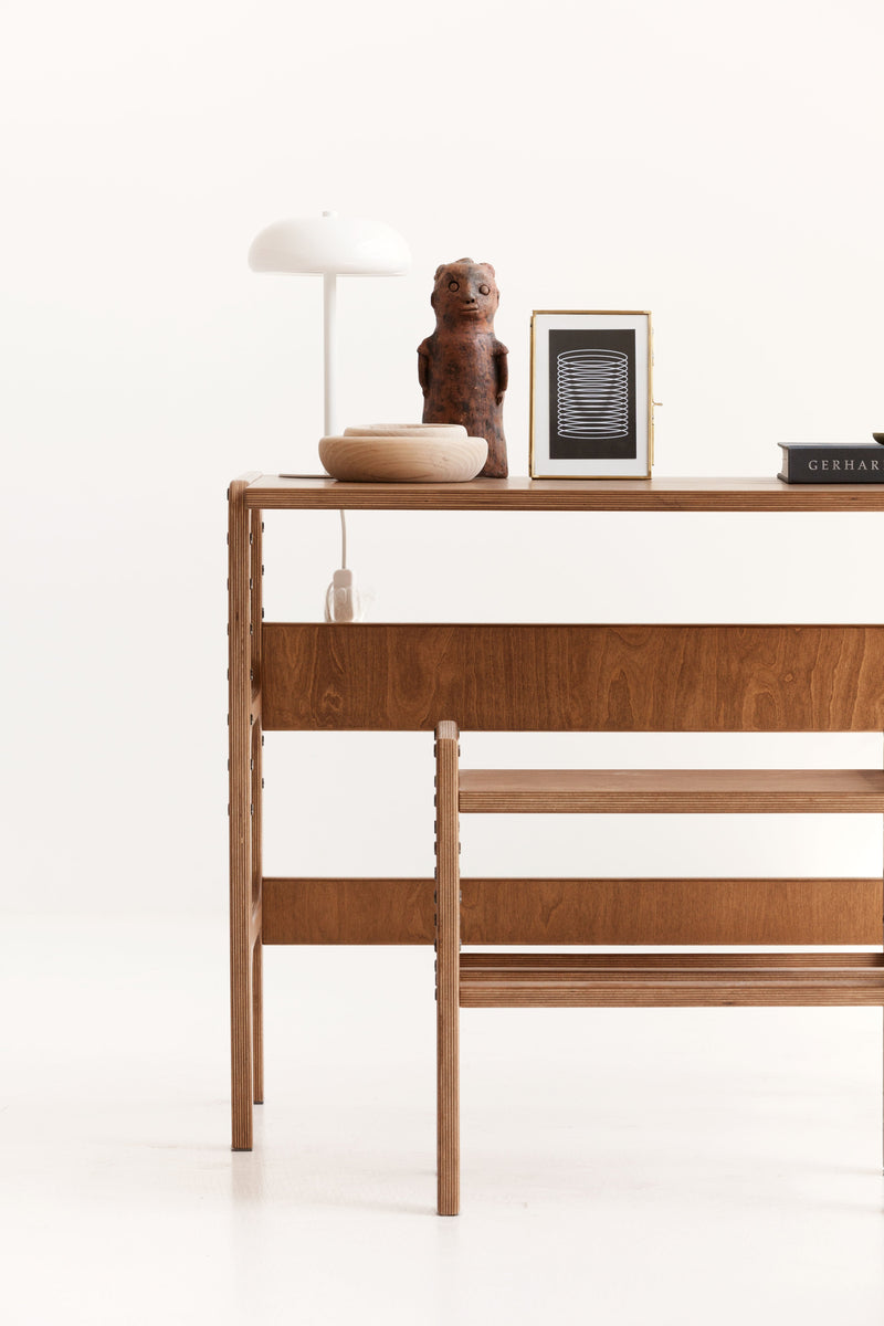 detail-of-wooden-growing-desk-for-kids-in-full-sun