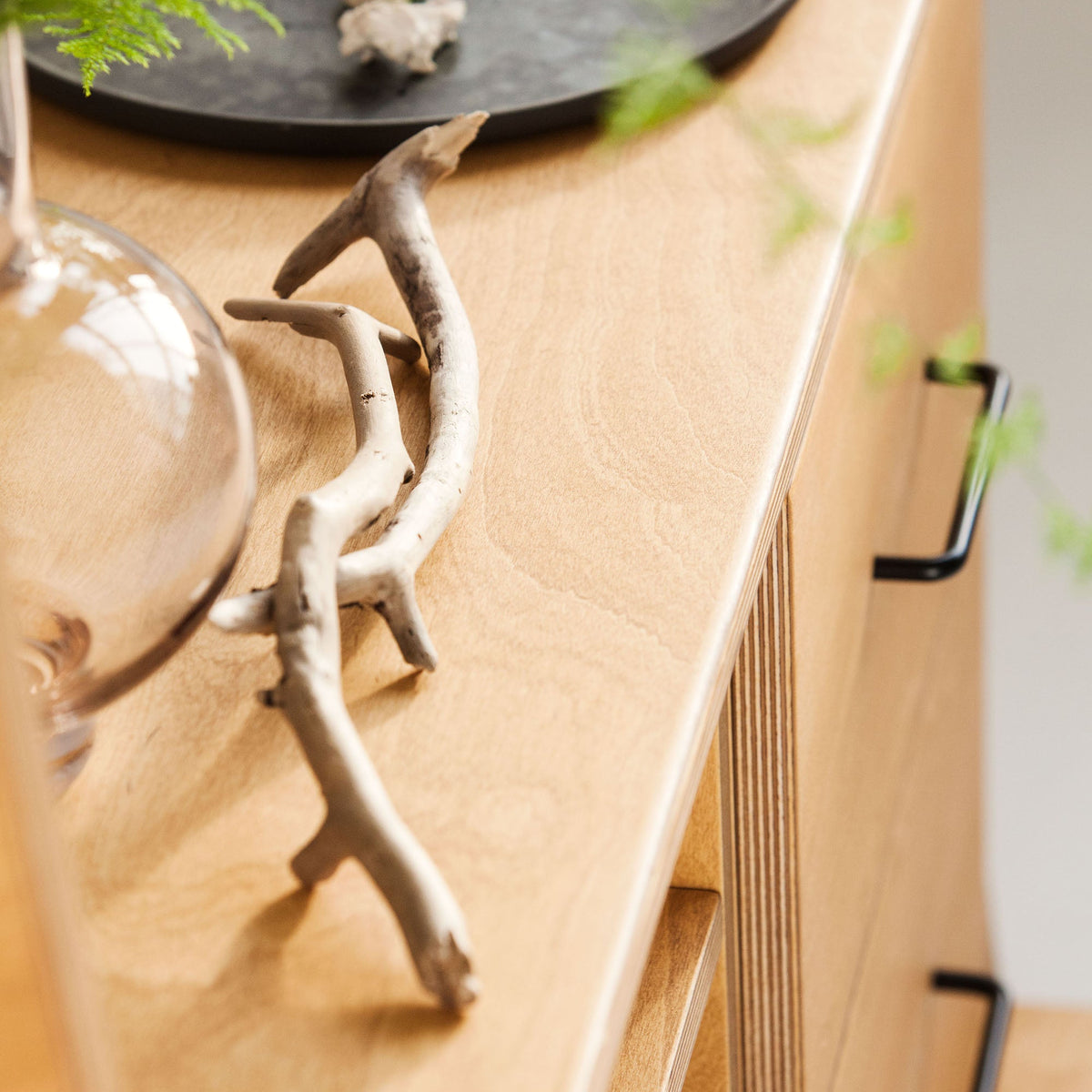 details-of-bookcase-mid-century-modern-wooden-design-in-the-afternoon-sun