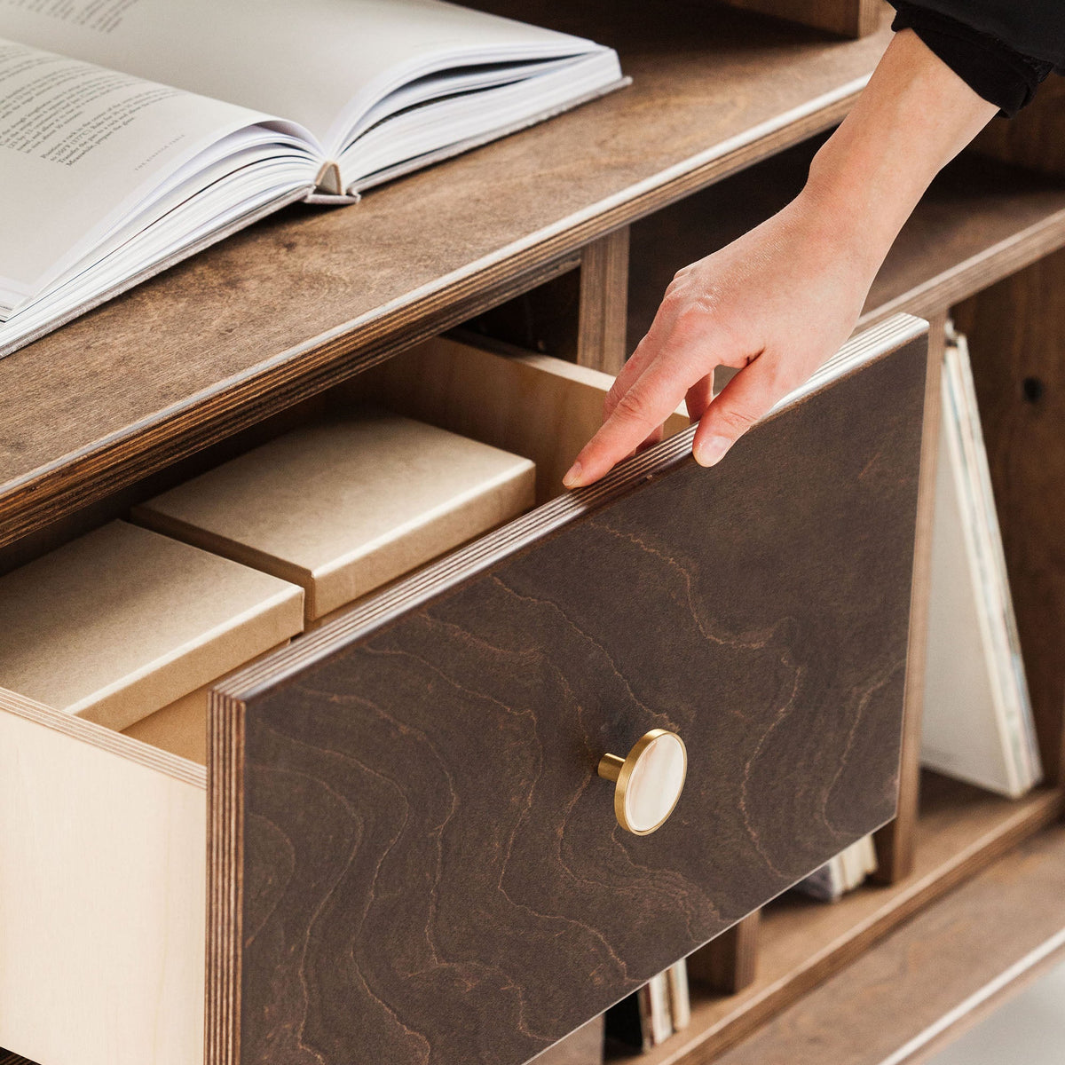drawer-of-mid-century-modern-sideboard-with-drawers-and-vinyl-storage-in-walnut-stain