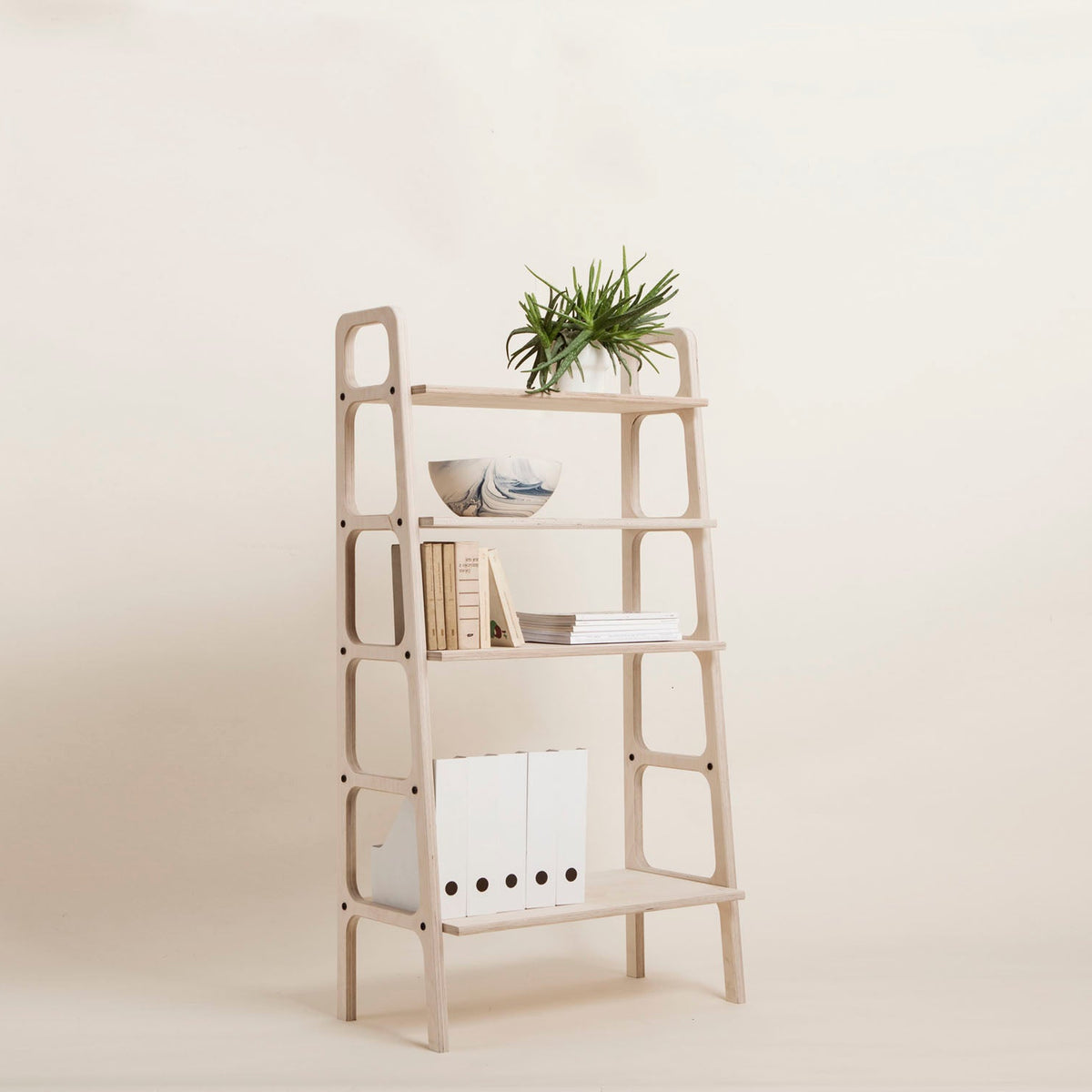 handmade-furniture-bookcase-in-light-background