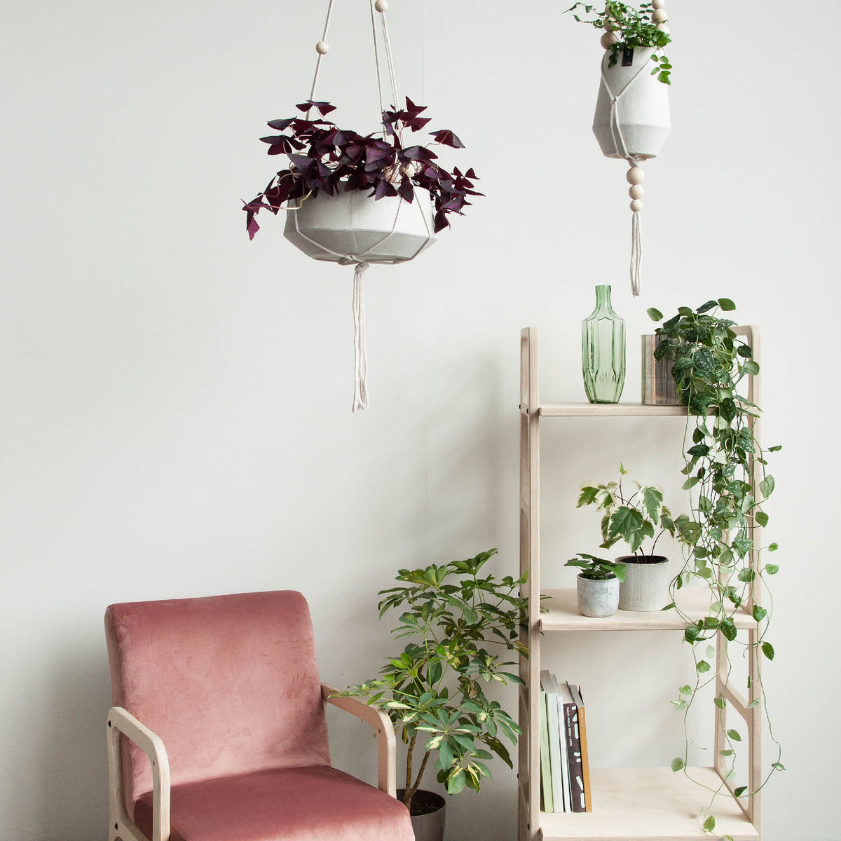 ladder-bookshelf-in-the-interior-with-armchair