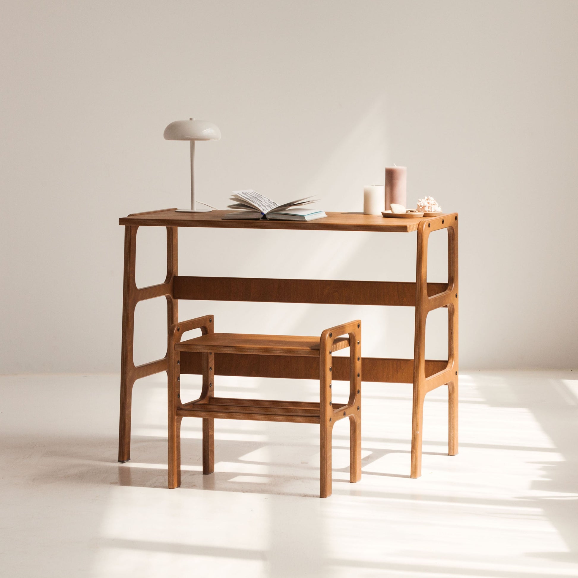 mid-century-computer-desk-walnut-stain-in-full-sun-wooden-desk