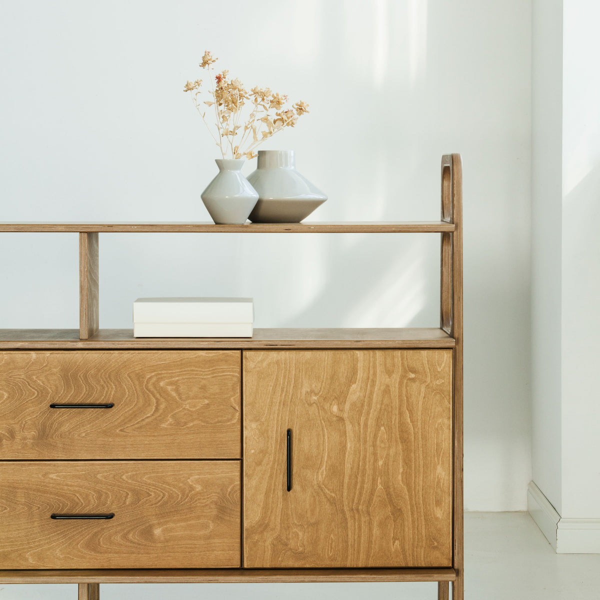 side-of-the-mid-century-modern-wooden-sideboard-oak-stain-with-cabinet-drawers-vinyl-storage