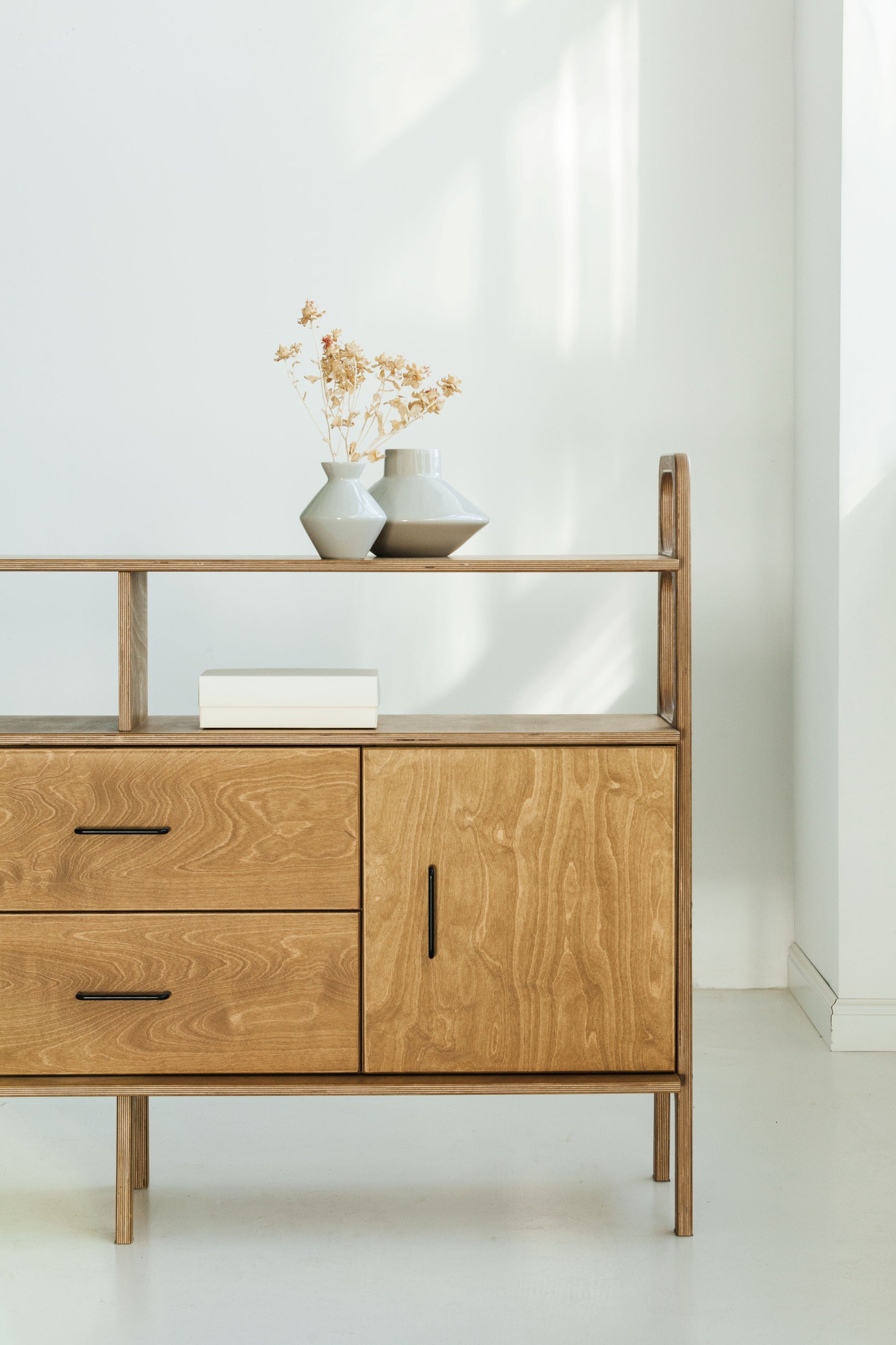 side-of-the-mid-century-modern-wooden-sideboard-oak-stain-with-cabinet-drawers-vinyl-storage