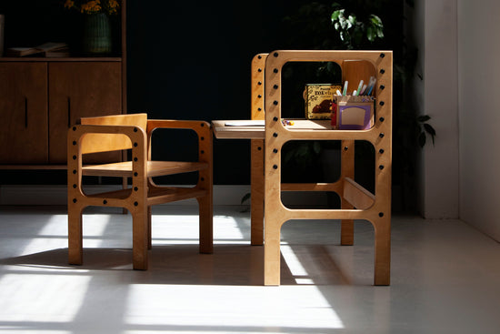 wooden-growing-desk-for-kids-in-full-sun
